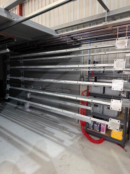 Galvanised top rails prepared for out-gassing